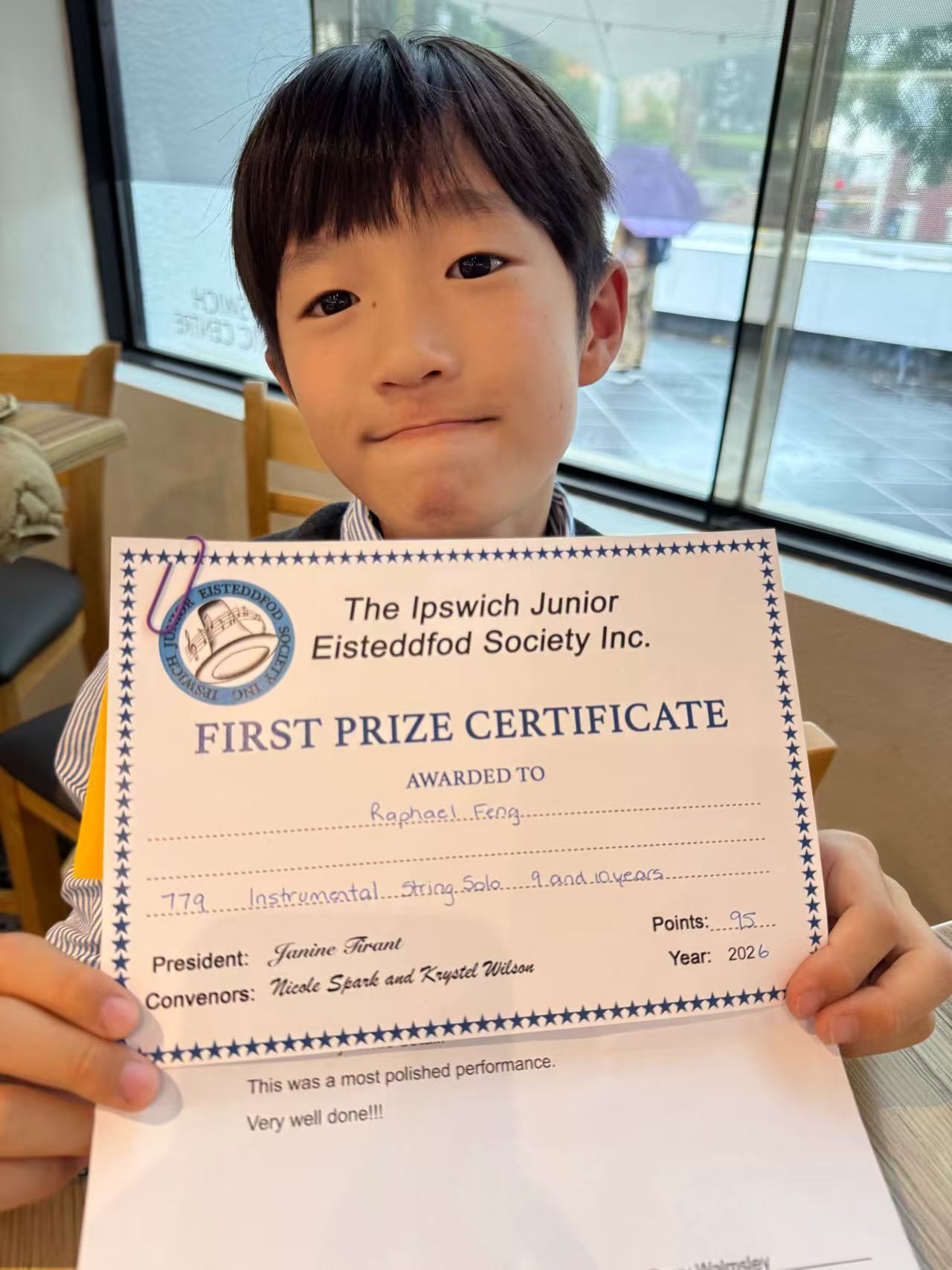 Raphael Feng with a first prize certificate from the Ipswich Junior Eisteddfod Society