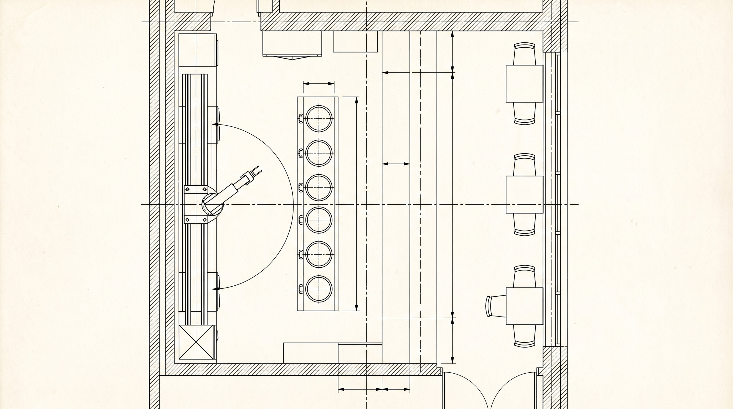 Plan drawing of the tenancy: robot arm on a linear rail with its swept arc, six boiling wells, the pass, the counter, tables along the glazed wall